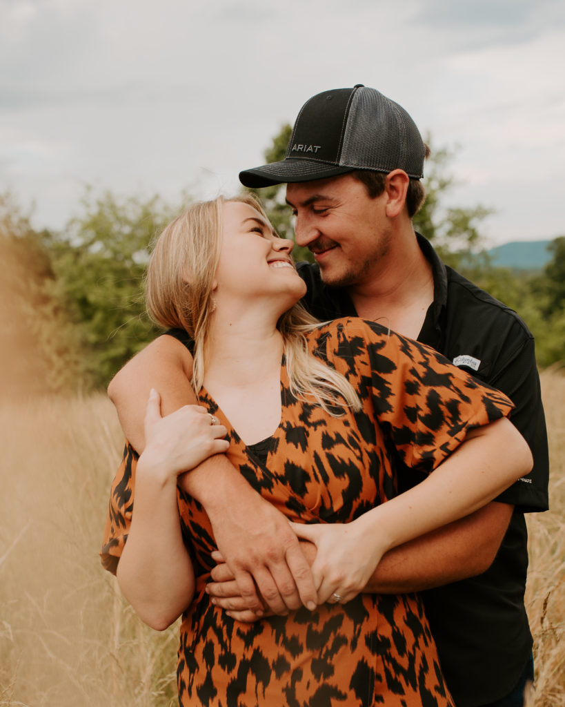 Engagement session in an open field on the Blue Ridge Parkway in Roanoke, Virginia.