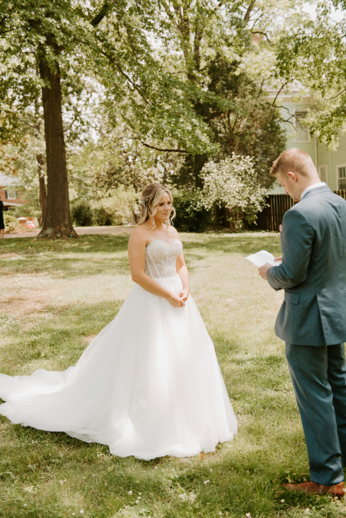 bride and groom reading personal vows at their intimate wedding in Virginia