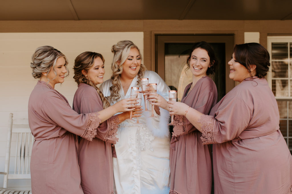 matching robes for bridesmaids getting ready on wedding day