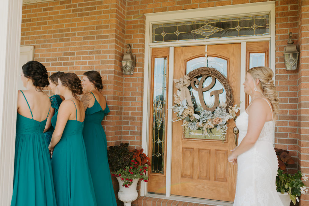 first look with bridesmaids photo, teal bridesmaid dresses with different styles