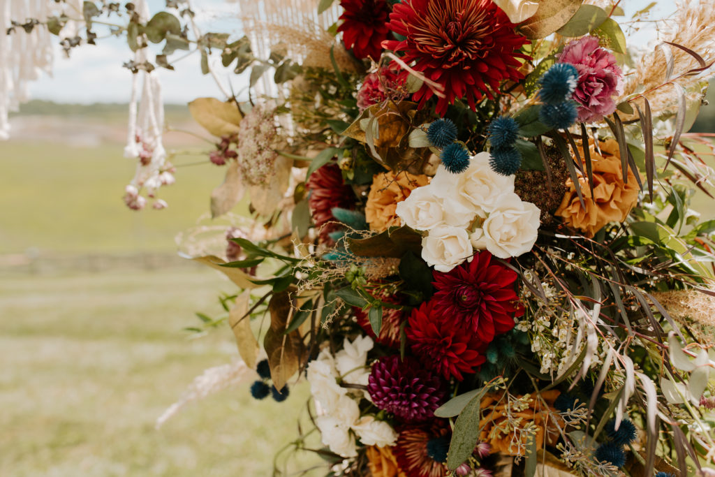 Dark Teal, Wine Burgundy, with gold accents florals for a Virginia backyard wedding day in Floyd, Virginia.
