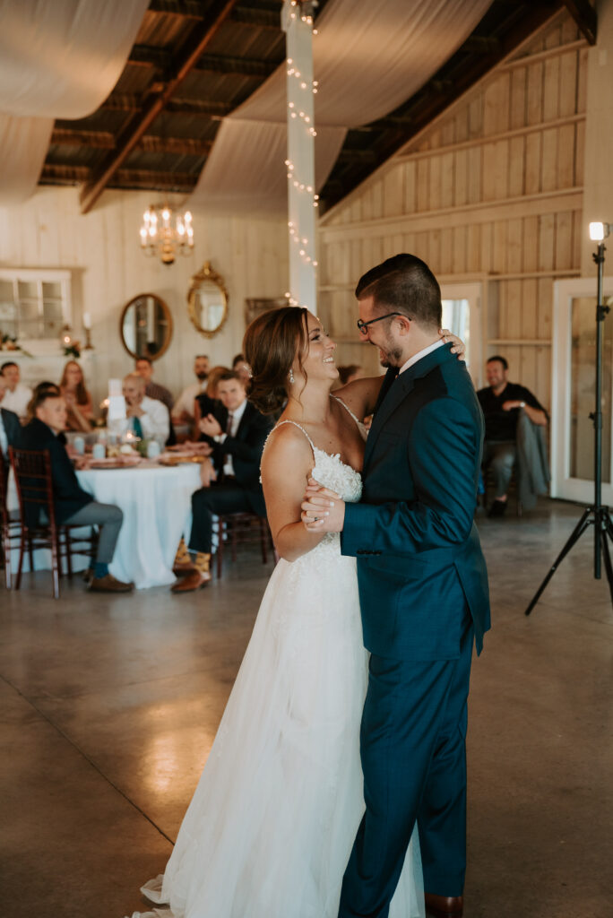 first dance photos during reception at old mill farm venue in bedford, Virginia