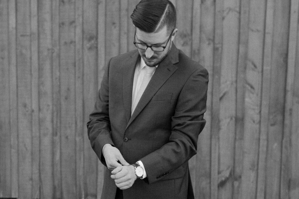 groom photos with final touches before the ceremony in bedford, virginia