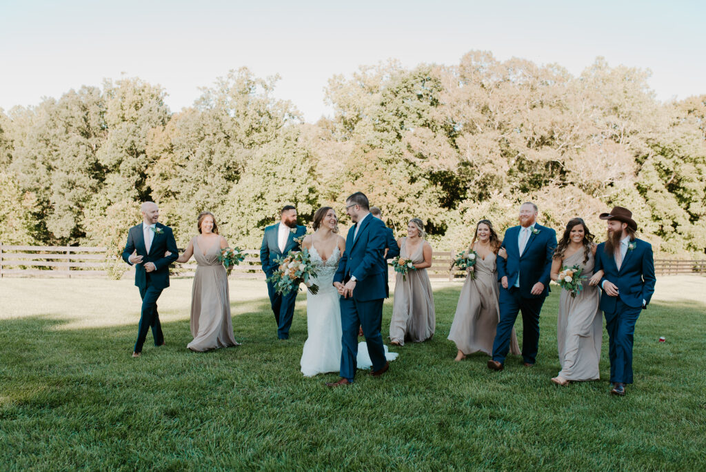 champagne bridesmaid dresses and blue suits with pink ties