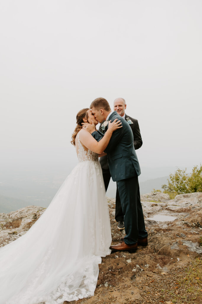 first kiss as husband and wife in the rain