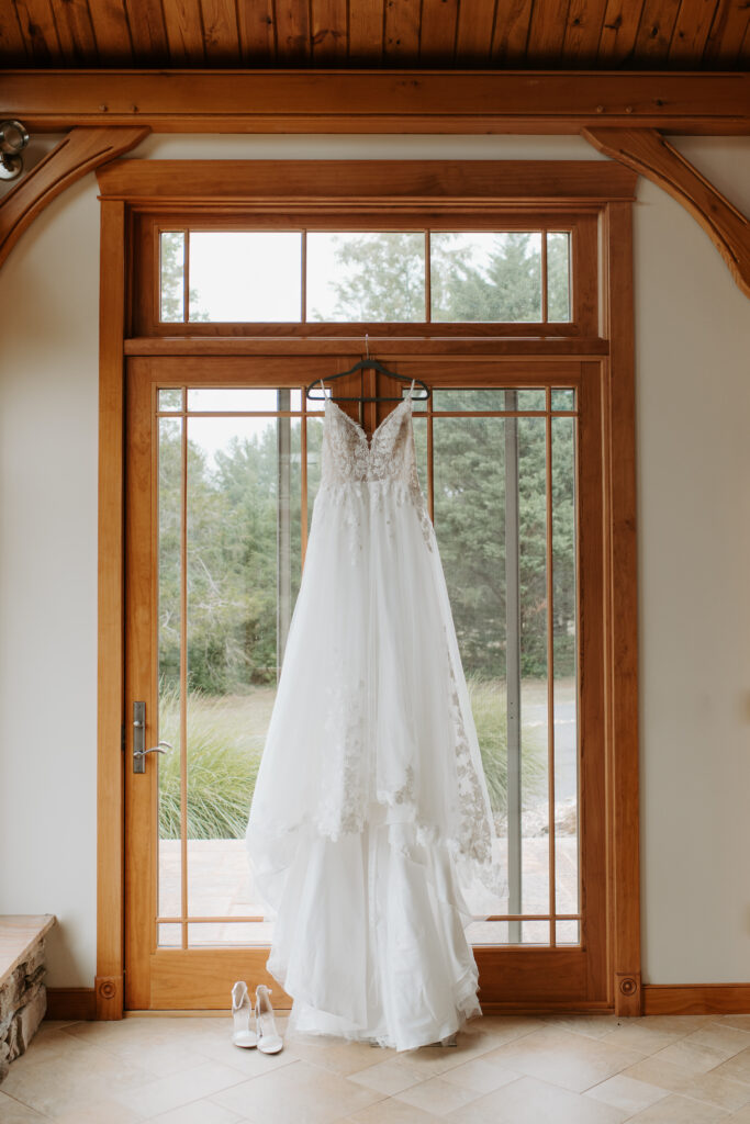 boho, flowy dress hanging up in the doorway of a rustic Airbnb outside of Shenandoah National Park