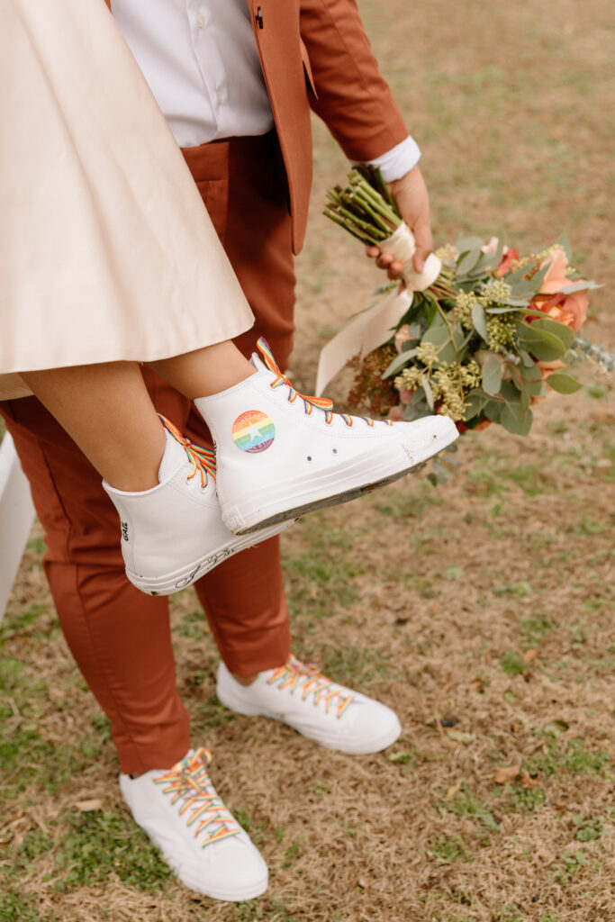 rainbow matching shoes for elopement in Cape Charles, Virginia
