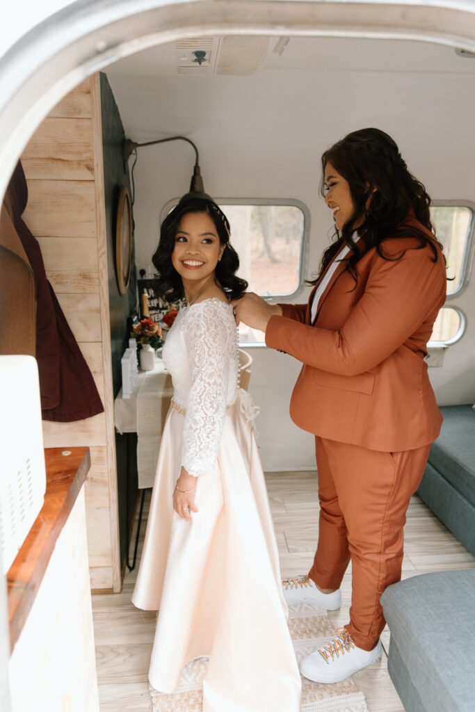 couple getting ready together at their Cape Charles elopement
